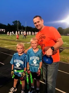 Dr. Regan Brown and his two sons