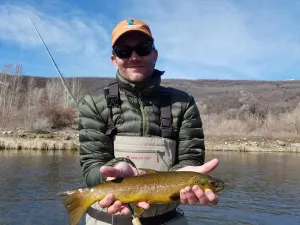 Dr Gregory Burns holding a fish